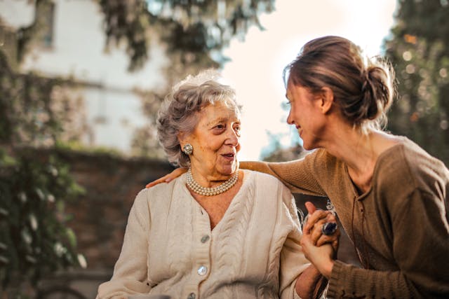Smiling person reviewing Medicare options on a tablet